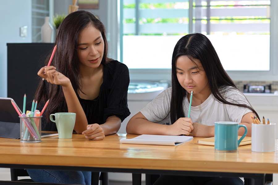 student and tutor together at a desk in Phoenix